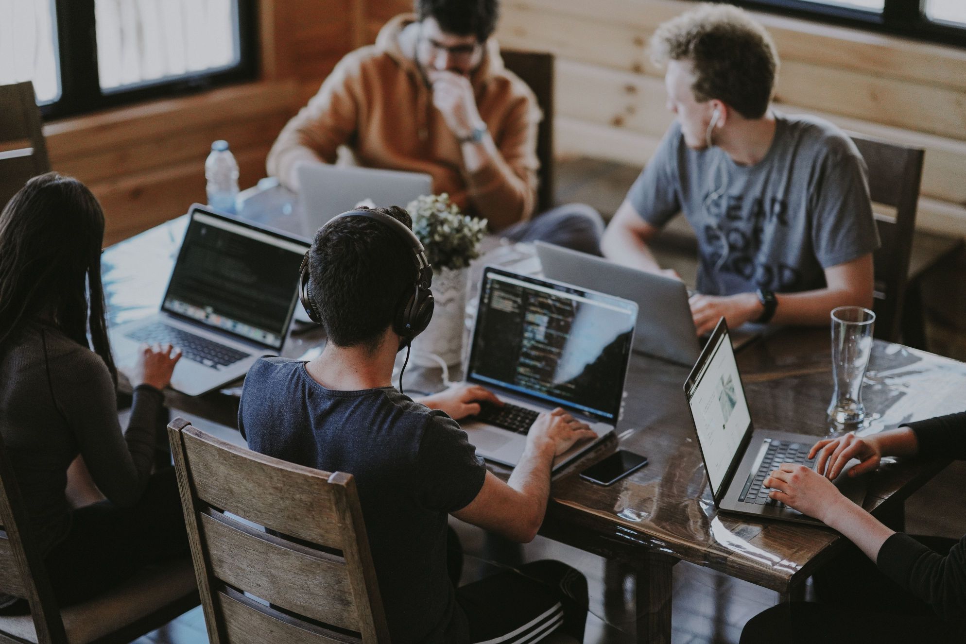 MixPath team working with laptops on a kitchen table